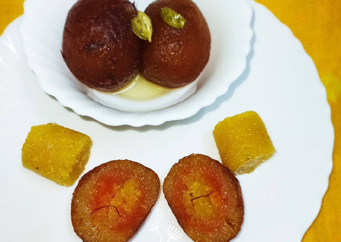 Stuffed Moong dal halwa Jamun with carrot and mango puree