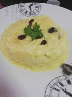 Una foto de Risotto de pavo con piña y champiñones