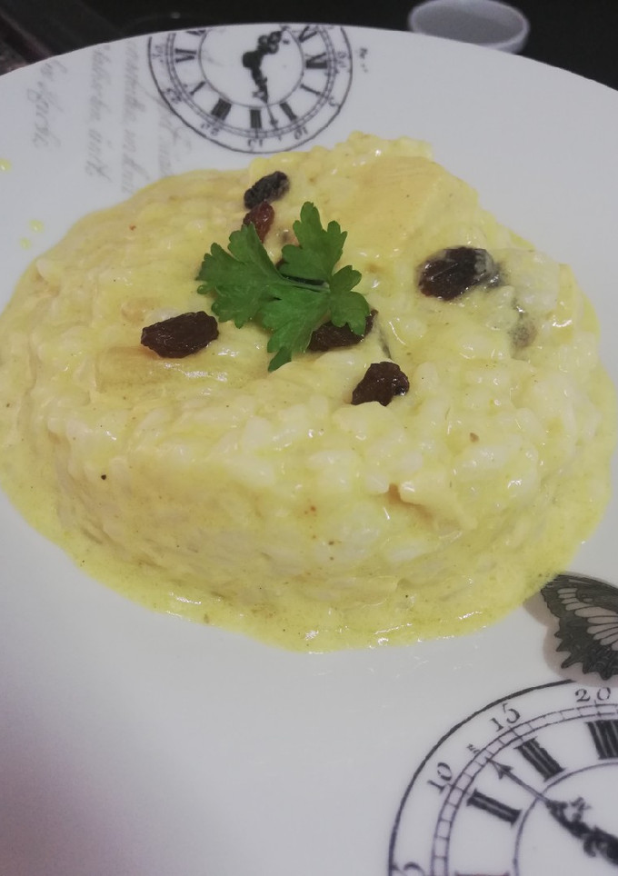 Una foto de Risotto de pavo con piña y champiñones