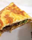 Tortilla rellena con espárragos y champiñones