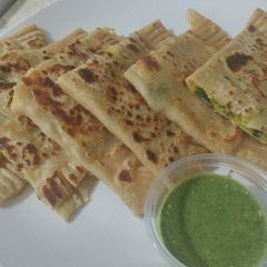 A picture of Potato gujiya paratha.