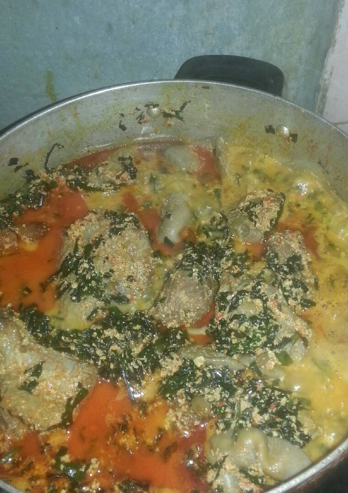 A picture of Egusi Soup with Assorted Meat And stock Fish.