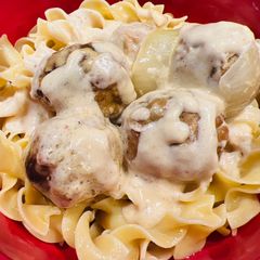 A picture of Crockpot Alfredo Italian Meatballs.