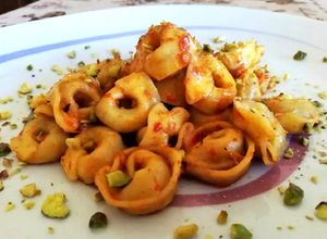 Foto di Tortellini ripieni di Carne con 'Nduja di Spilinga e Granella di Pistacchio di Bronte
