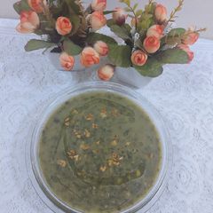 A picture of Garlic tarka spenich with chana dal.