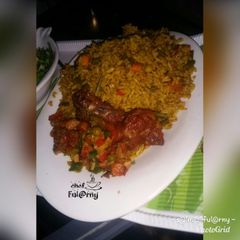 A picture of Tasty jollop rice with pepper chicken by s@lma ful@rny.