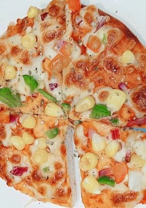 रोटी पिज़्ज़ा (roti pizza recipe in Hindi) रेसिपी मुख्य फोटो