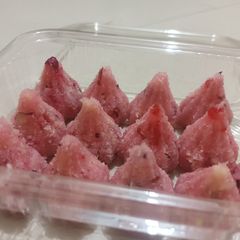 Rose coconut mava modaks A picture of Rose coconut mava modaks.