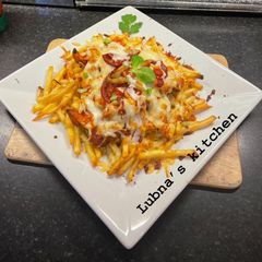 A picture of Chicken Loaded Fries:.