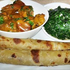 Coconut chicken and soft layerd chapati A picture of Coconut chicken and soft layerd chapati.
