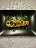 Calamari ripieni caramellati con rum al miele