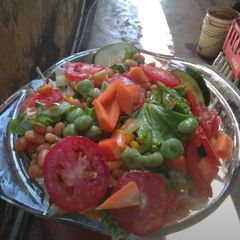 A picture of Grilled Corn and cashew salad.