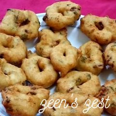 A picture of Two Lentil Medu Vadas.