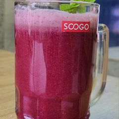 A picture of Pomegranate + Amla juice.