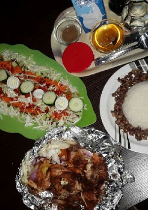 A picture of Rice &beans with oven grilled chicken.