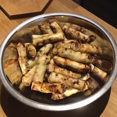 A picture of BBQ spring rolls.