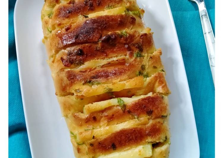 Bagaimana Menyiapkan Hasselback bread garlic yang Enak