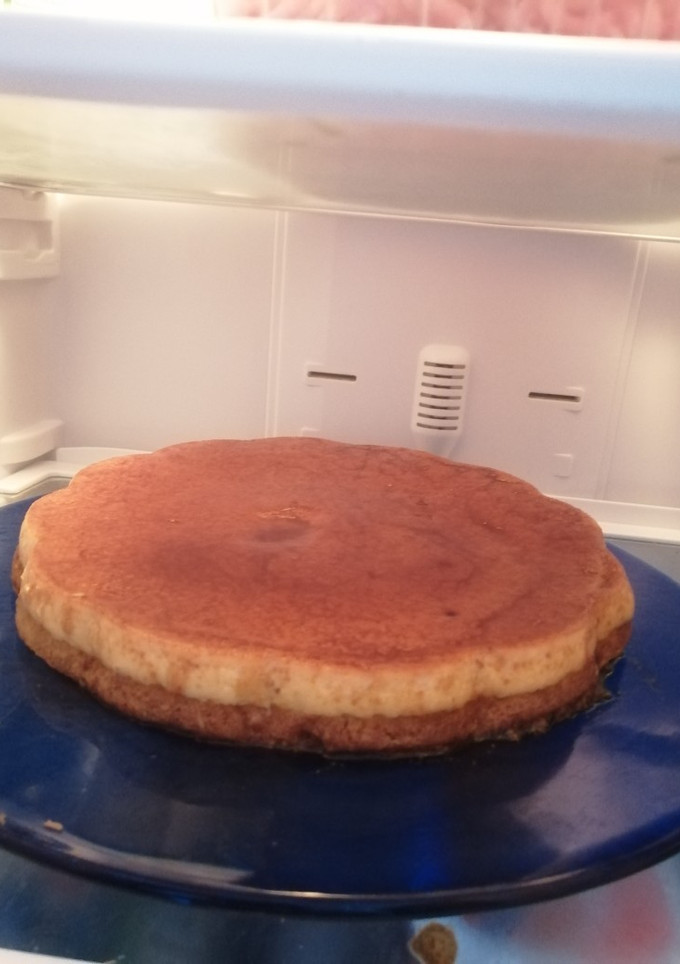 Una foto de Rico bizcocho con flan😋😋😋