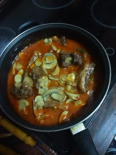 Una foto de Costillas en salsa de champiñones