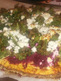 A picture of Veggie Pizza: Yes... it's a cauliflower crust!!.