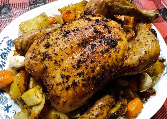 One tray roast whole chicken, potatoes and veg