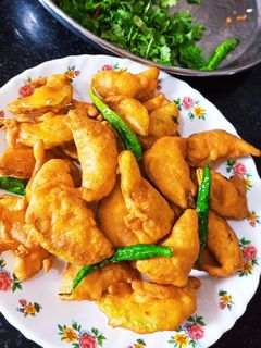 लौकी के पकोड़े (lauki ke pakode recipe in Hindi) रेसिपी मुख्य फोटो