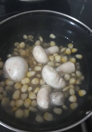 A picture of Boiled mushroom Corn soup.