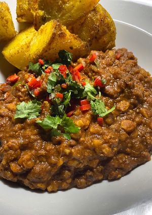 A picture of Slow-cooked Haleem (traditional Pakistani beef and lentil stew).