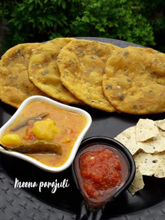 आलू की मसालेदार पूरी (Aloo ki masaledar puri recipe in Hindi) रेसिपी मुख्य फोटो