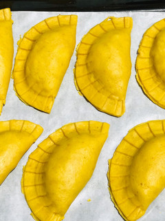 A picture of Turmeric meatpie.