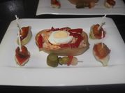 Una foto de tapas de mejillones