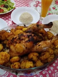 صورة لوصفة دجاج محمر بالتتبيلة الحارة مع بطاطا متبلة