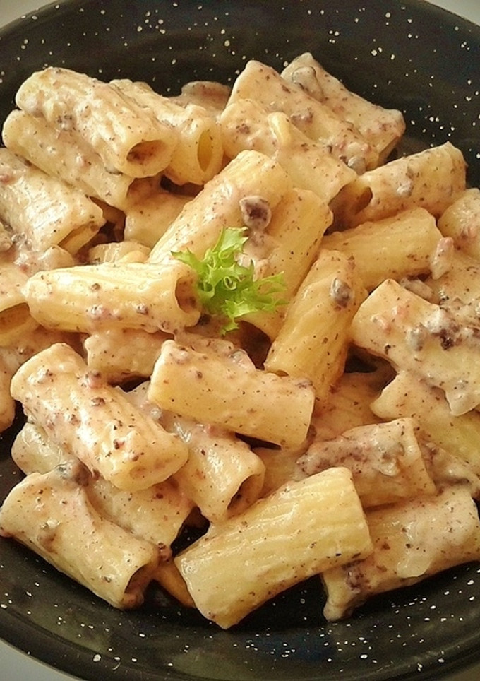 Una foto de Rigatoni con crema de morcilla, foie y champiñones
