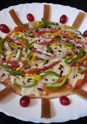 A picture of Uttapam Pizza.