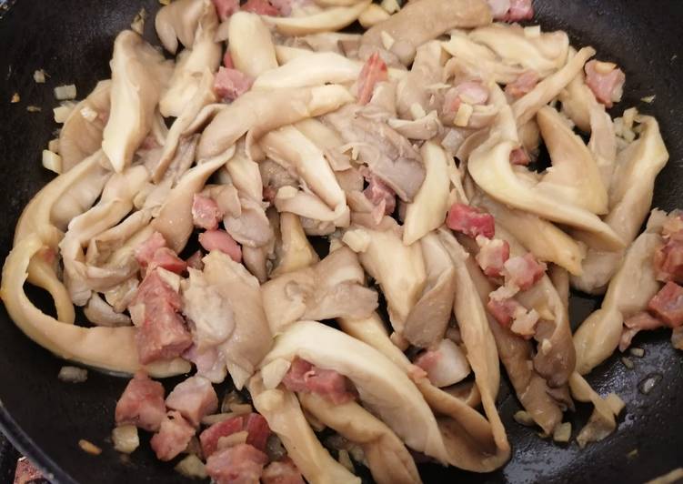 Setas al ajillo con jamón