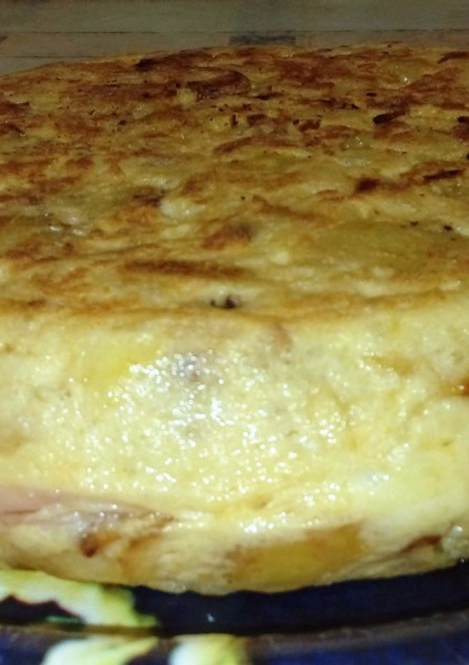 Una foto de Tortilla de patata rellena