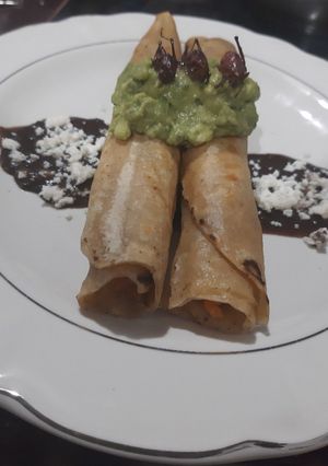 A picture of Crispy Chicken Tinga Tacos.