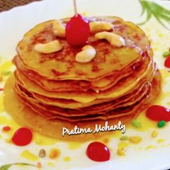 A picture of Pineapple Pancakes with honey glaze.
