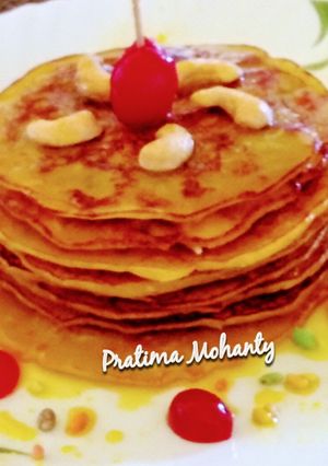 A picture of Pineapple Pancakes with honey glaze.