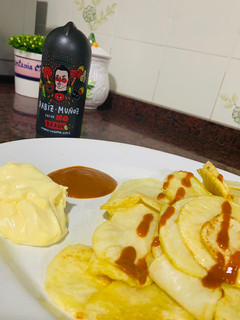 Una foto de Patatas con salsa brava y alioli a la mostaza de Tonino ❌⭕️