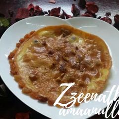 A picture of Hyderabadi Shomlette with Dry Fruits.