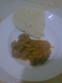 A picture of Wet beef fry and ugali.