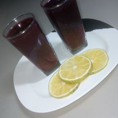 A picture of Zobo and orange juice.
