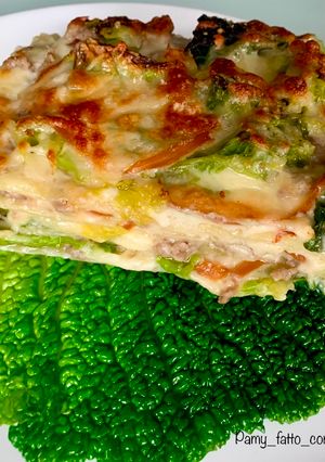 A picture of Lasagna with Savoy Cabbage, Smoked Scamorza, and Cotechino.