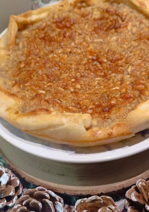 A picture of Christmas Pine Nut and Walnut Tart.