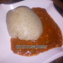 A picture of Tuwon dawa with okro soup.