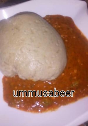 A picture of Tuwon dawa with okro soup.
