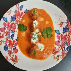 A picture of Malai kofta in gravy.