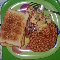 A picture of Toast with sausage & omelette.