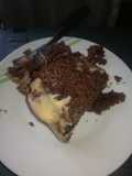 Chocolate poke cake with white chocolate frosting